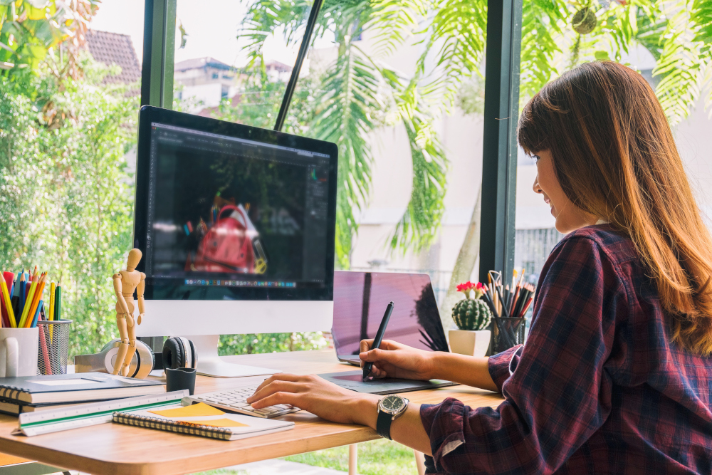 A Girl Using A Computer Drawing Program